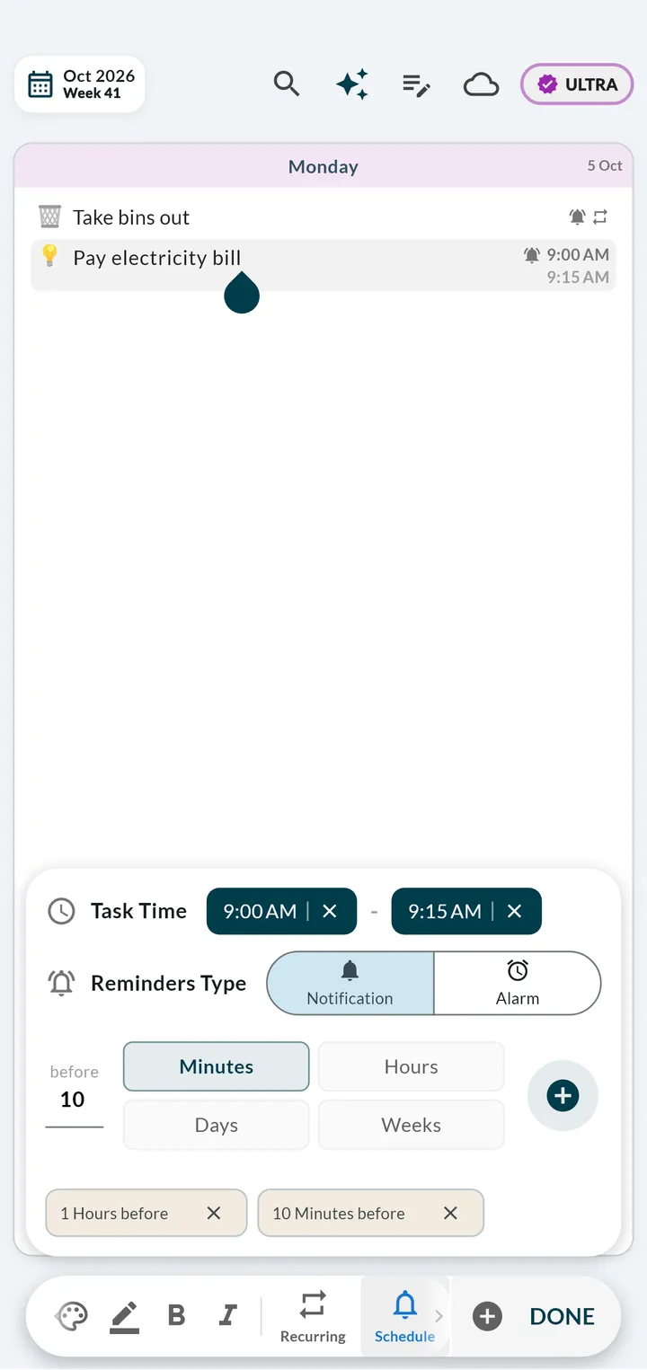 Weeklo day opened in the focused view with the Schedule panel showing a task time of 9:00 to 9:15 AM, reminder type notification or alarm, and reminders one hour and ten minutes before